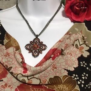 Vtg Necklace red with peach beads & burnt orange center. EUC